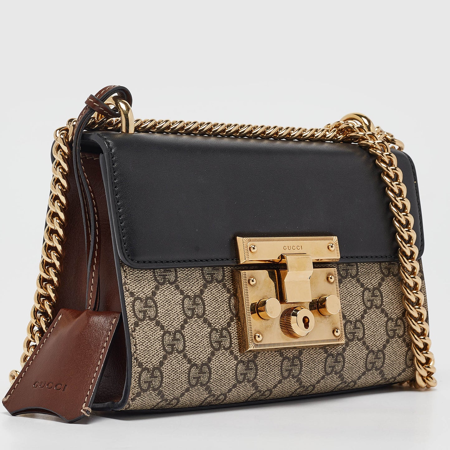 Luxury Gucci Trending 2025 Black/beige Gg Supreme Canvas And Leather Small Padlock Shoulder Bag..