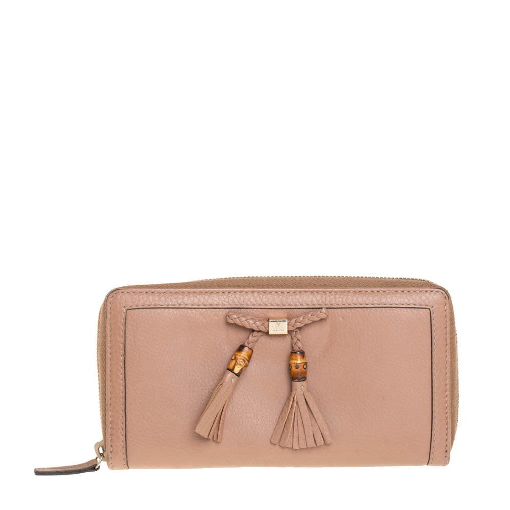 Luxury Gucci Trending 2025 Beige Leather Bamboo Tassel Bow Zip Around Wallet..
