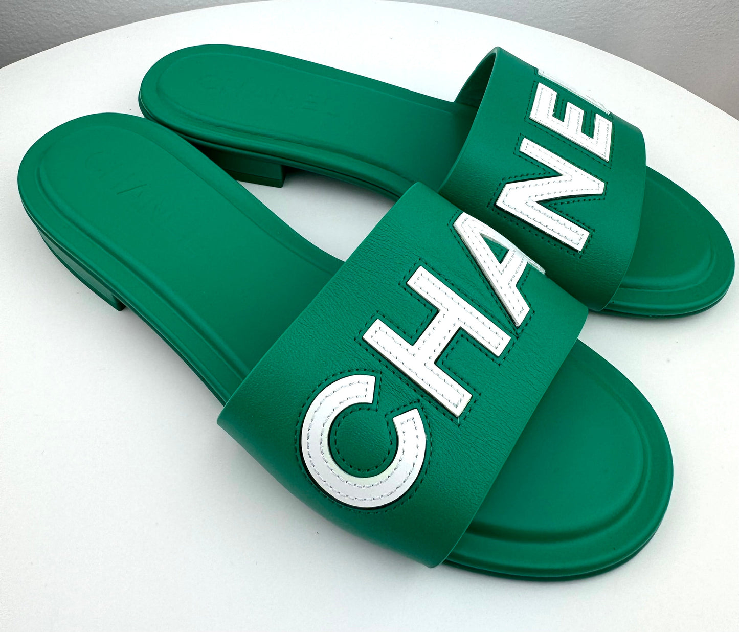 Chanel 23P Green White Leather CC Logo Slide Sandal Flat