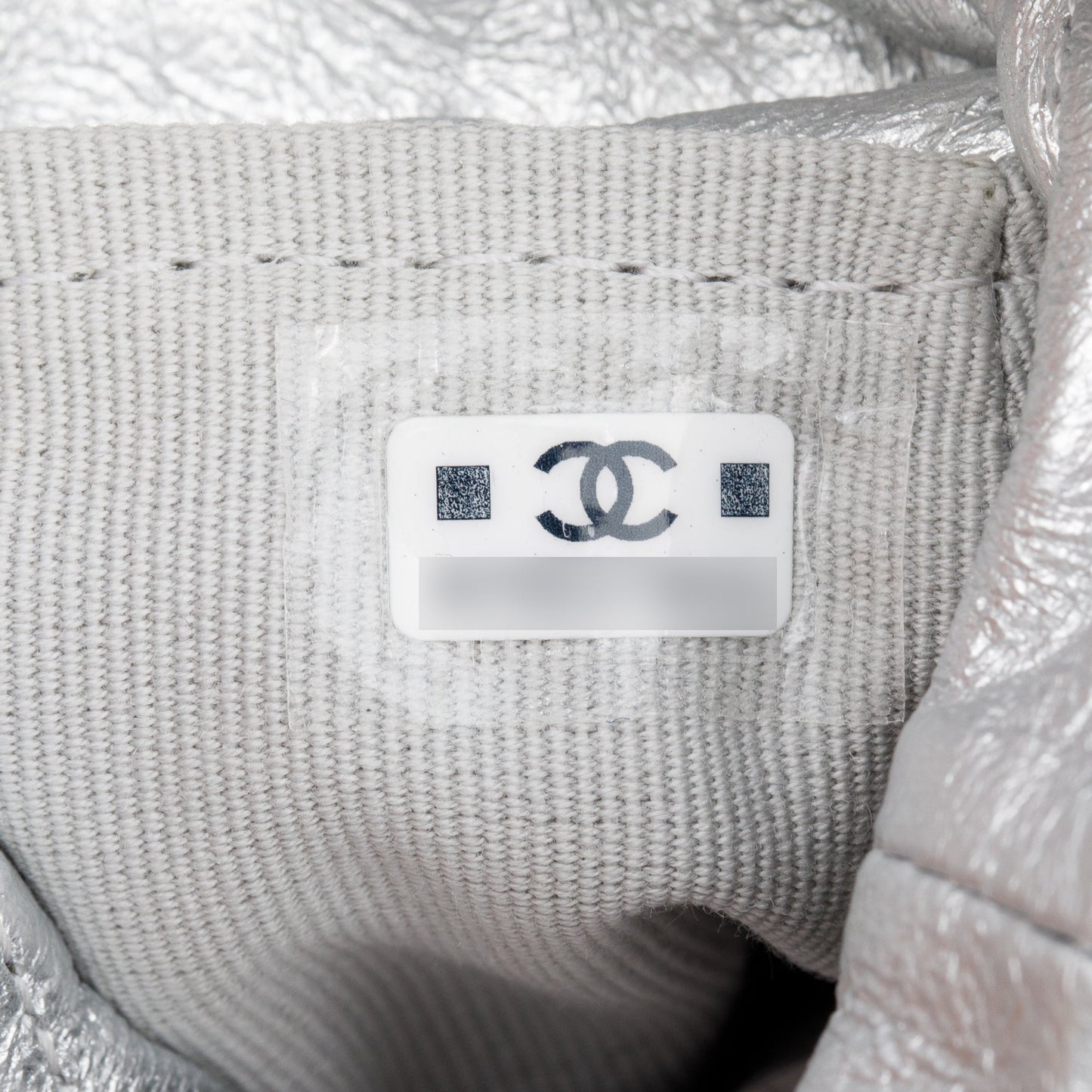 Chanel 2023 Metallic Silver Calfskin Leather Micro Drawstring Bucket Bag