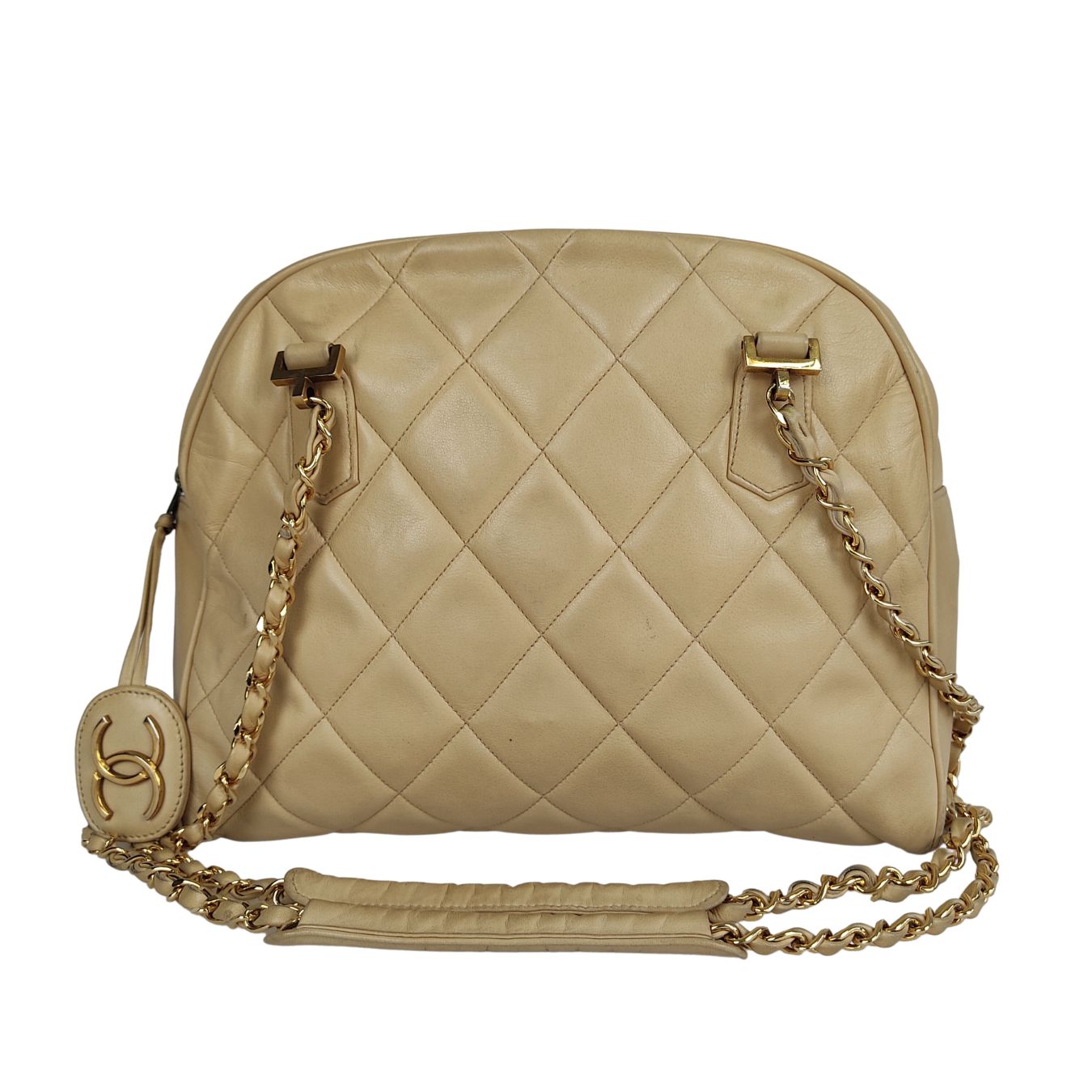 Luxury Chanel shoulder bag in beige matelasse leather from the 80s