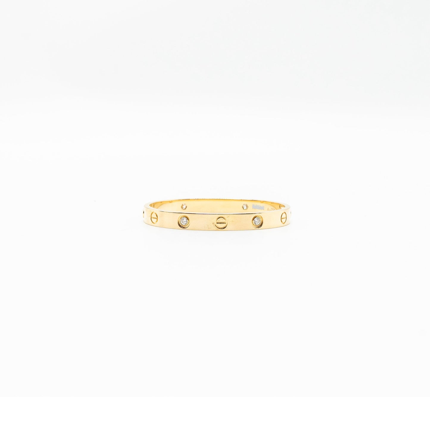 Cartier size 15 love bracelet yellow gold, 4 diamonds