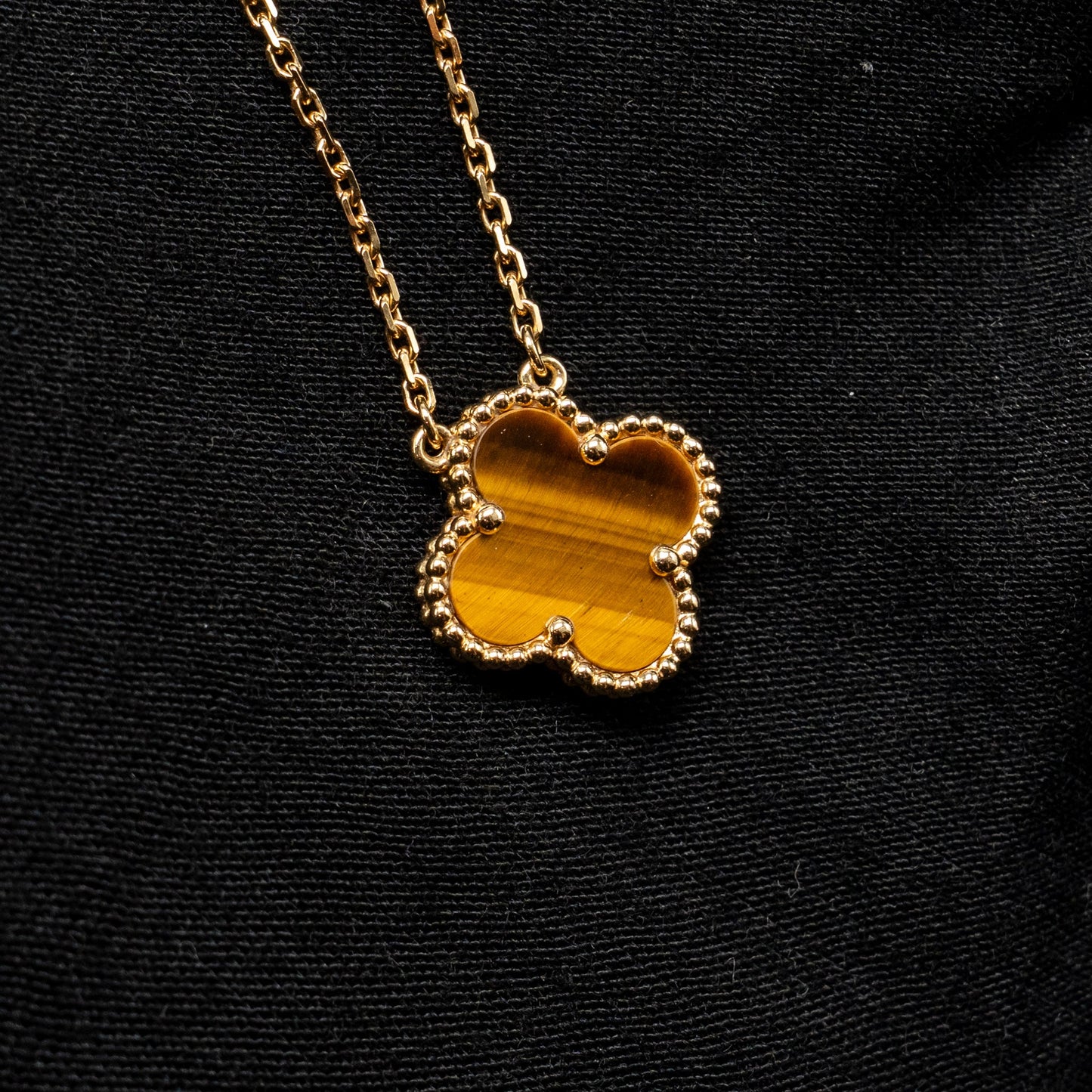 Van Cleef and Arpels vintage Alhambra pendant 18K yellow gold, tiger eye