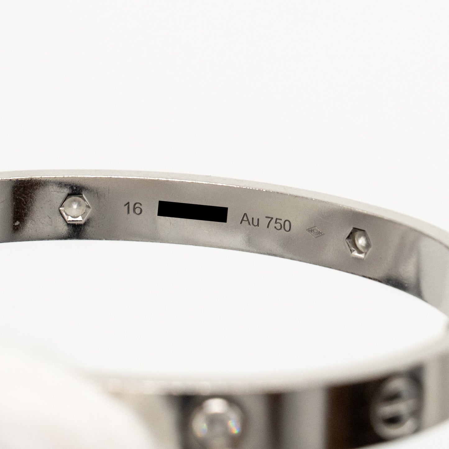 Cartier size 16 love bracelet white gold with 4 diamonds