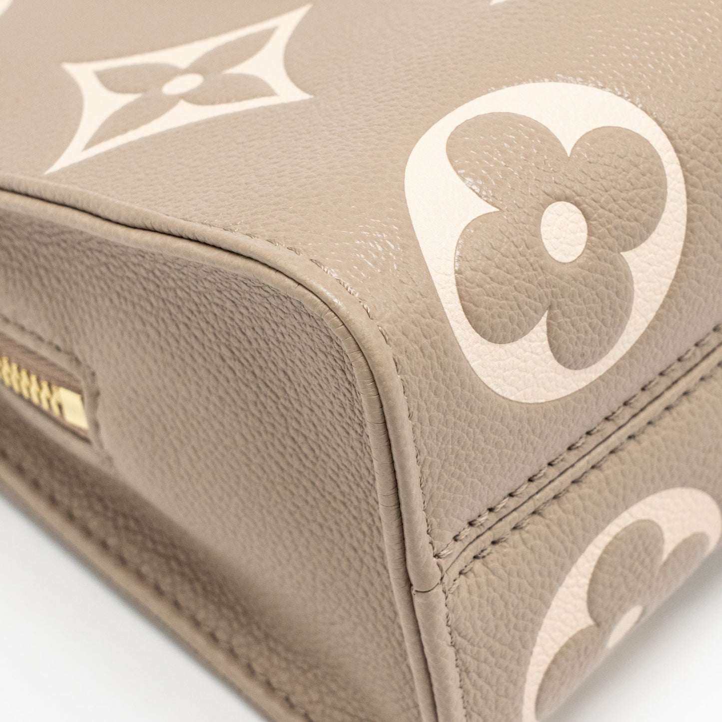 Louis Vuitton OnTheGo East West Monogram Empreinte Leather Dove/Cream GHW