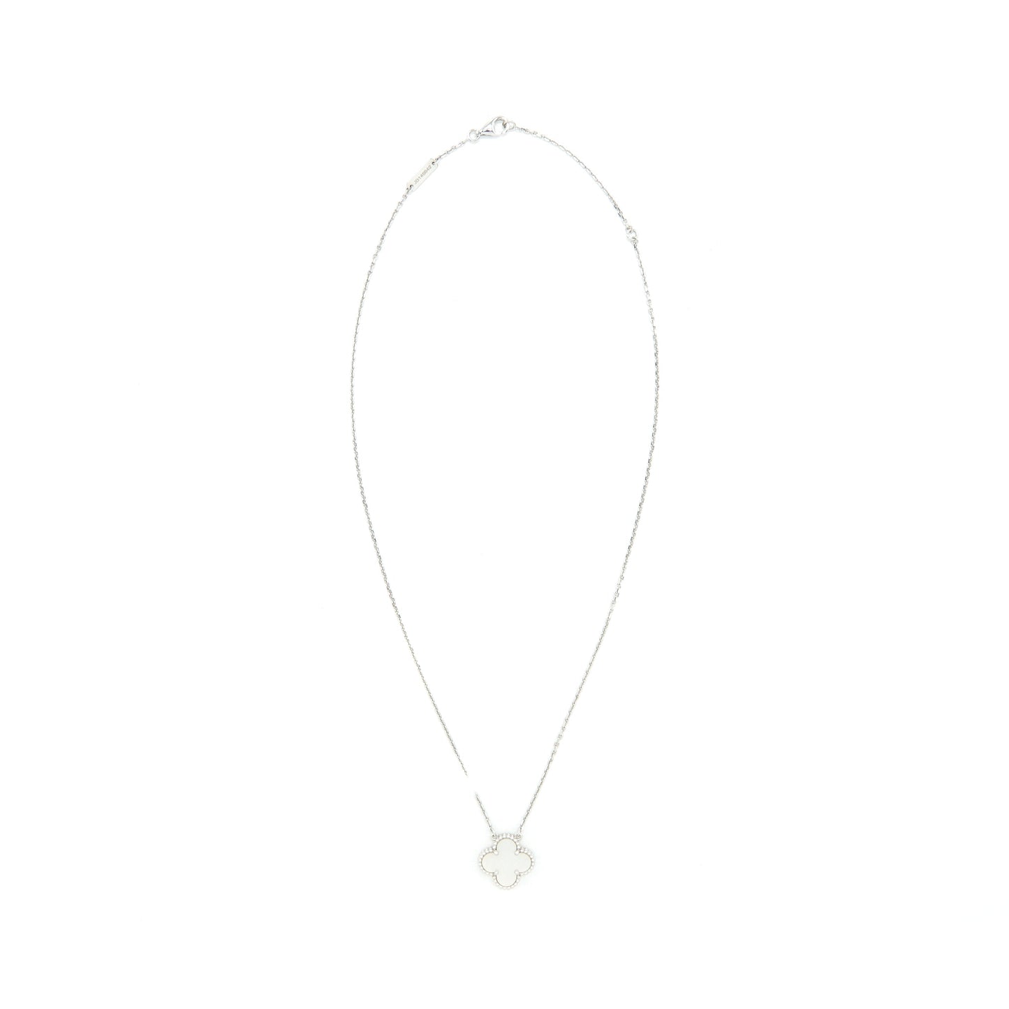 Van Cleef and Arpels vintage Alhambra pedent white Gold with mother of Pearl