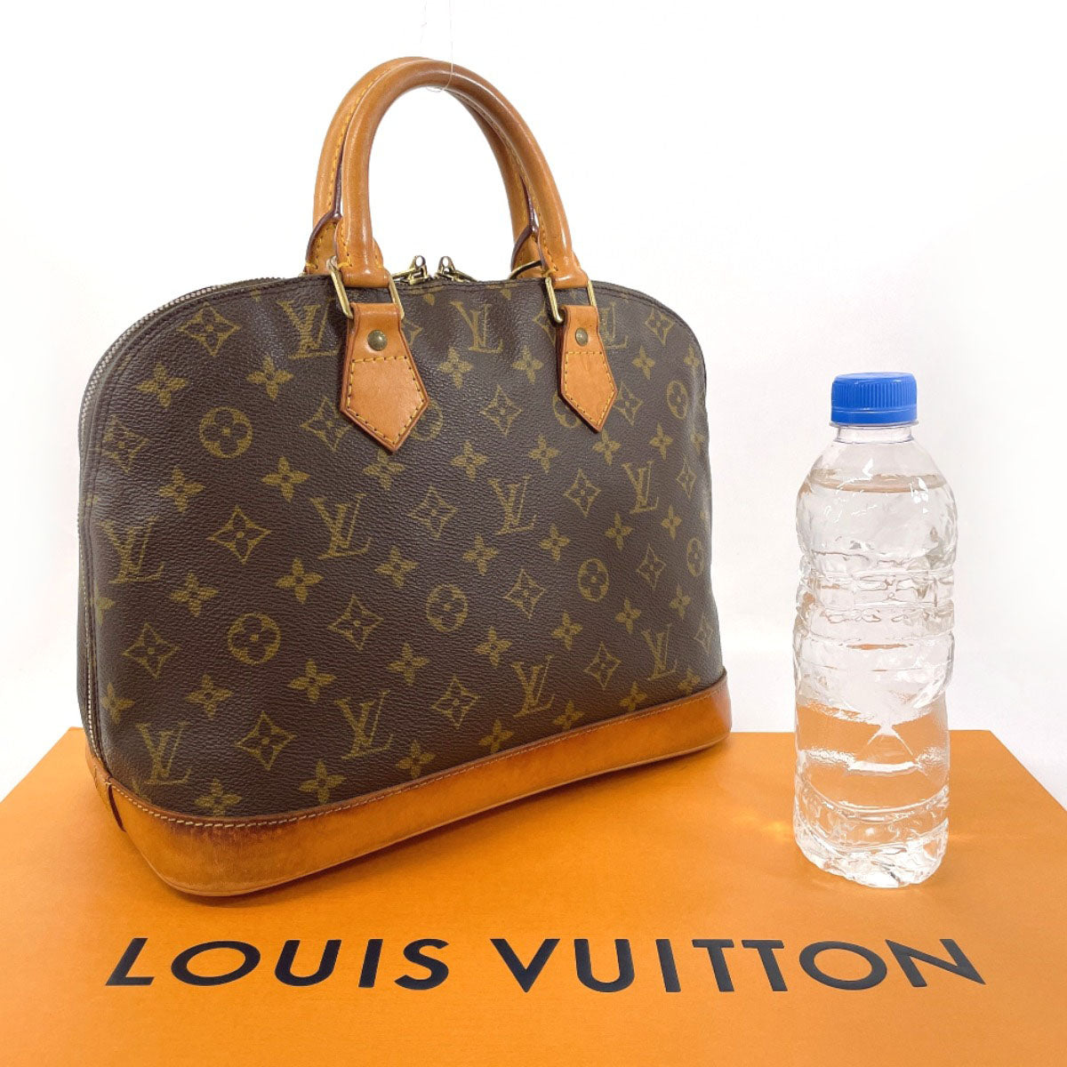 LOUIS VUITTON Handbag M51130 Monogram canvas, tanned leather Brown Alma