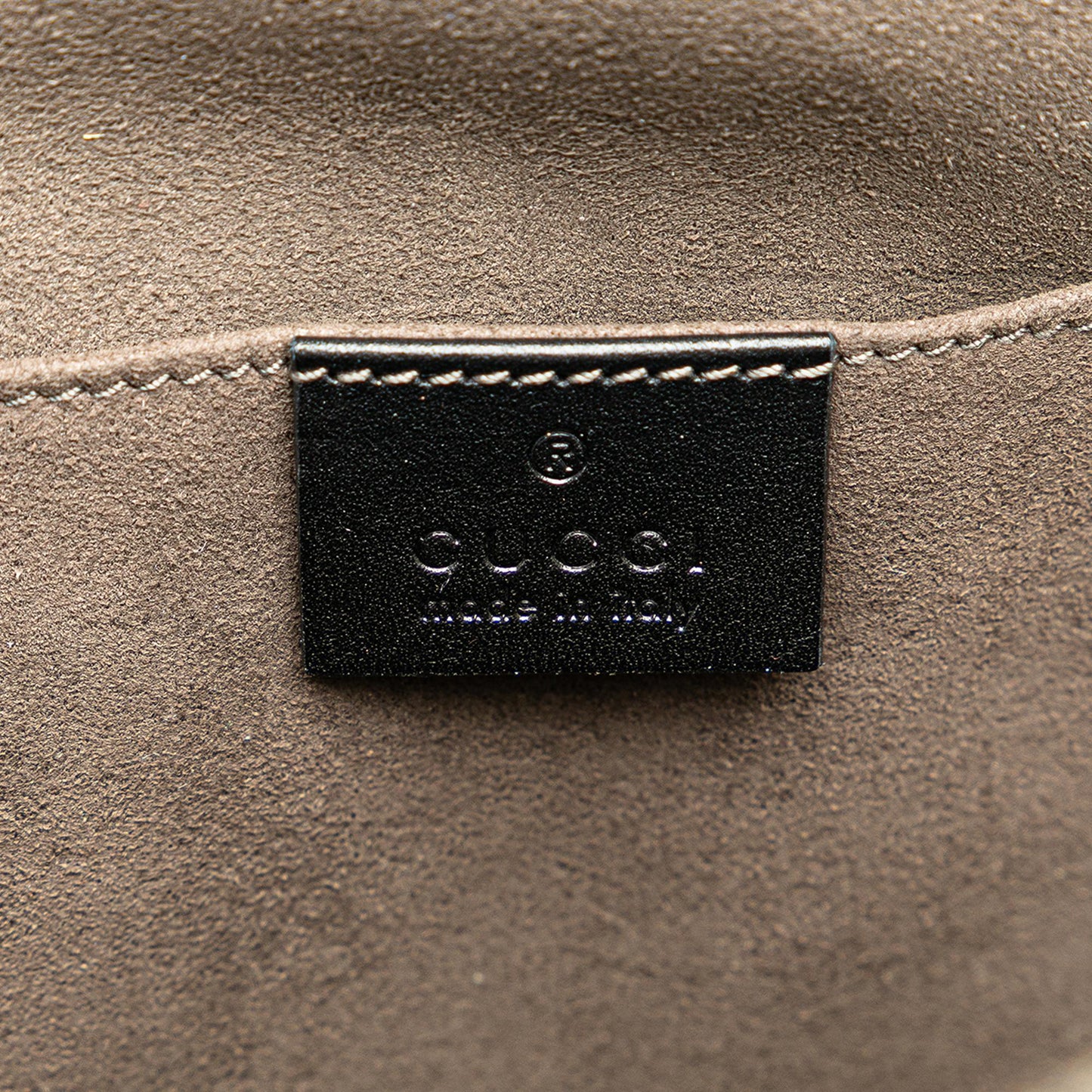 Gucci Guccissima Sling Backpack
