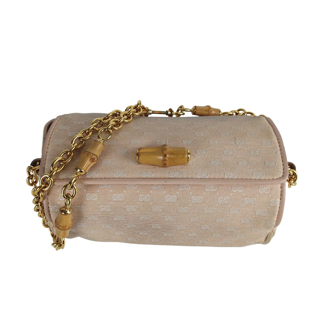 Luxury Gucci vintage Bamboo shoulder bag in pink GG canvas