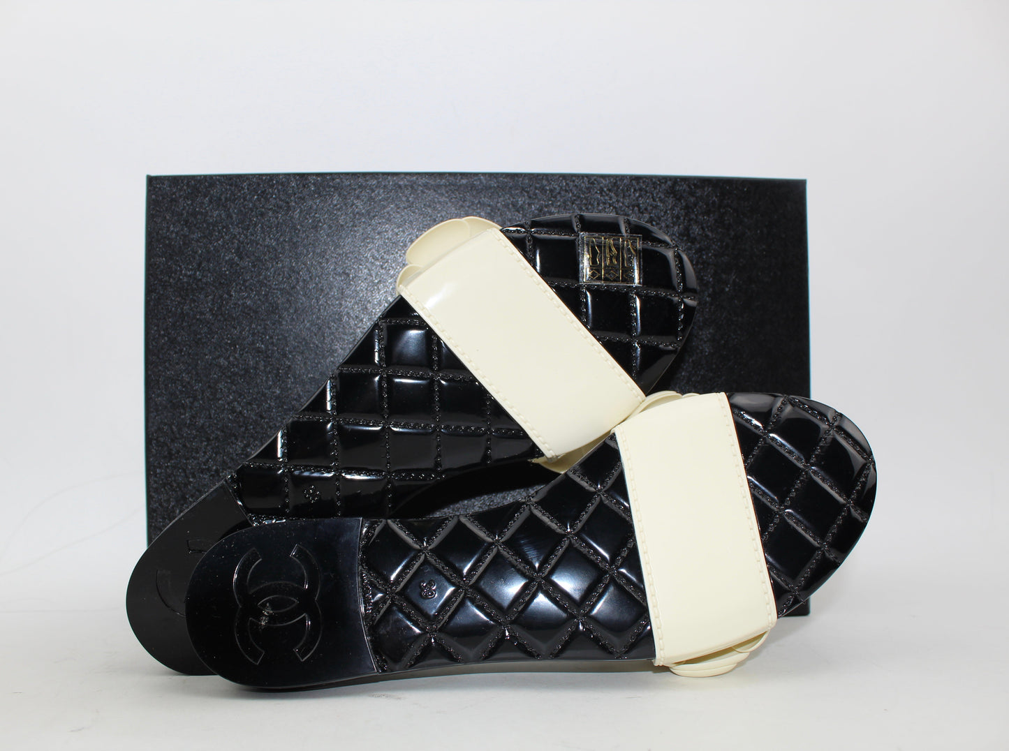 Chanel PVC Slides with Camellia Flowers