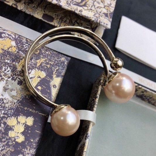 Luxury DiorDIO TRIBALES BANGLE GOLD AND PEARL PINK BRACELET