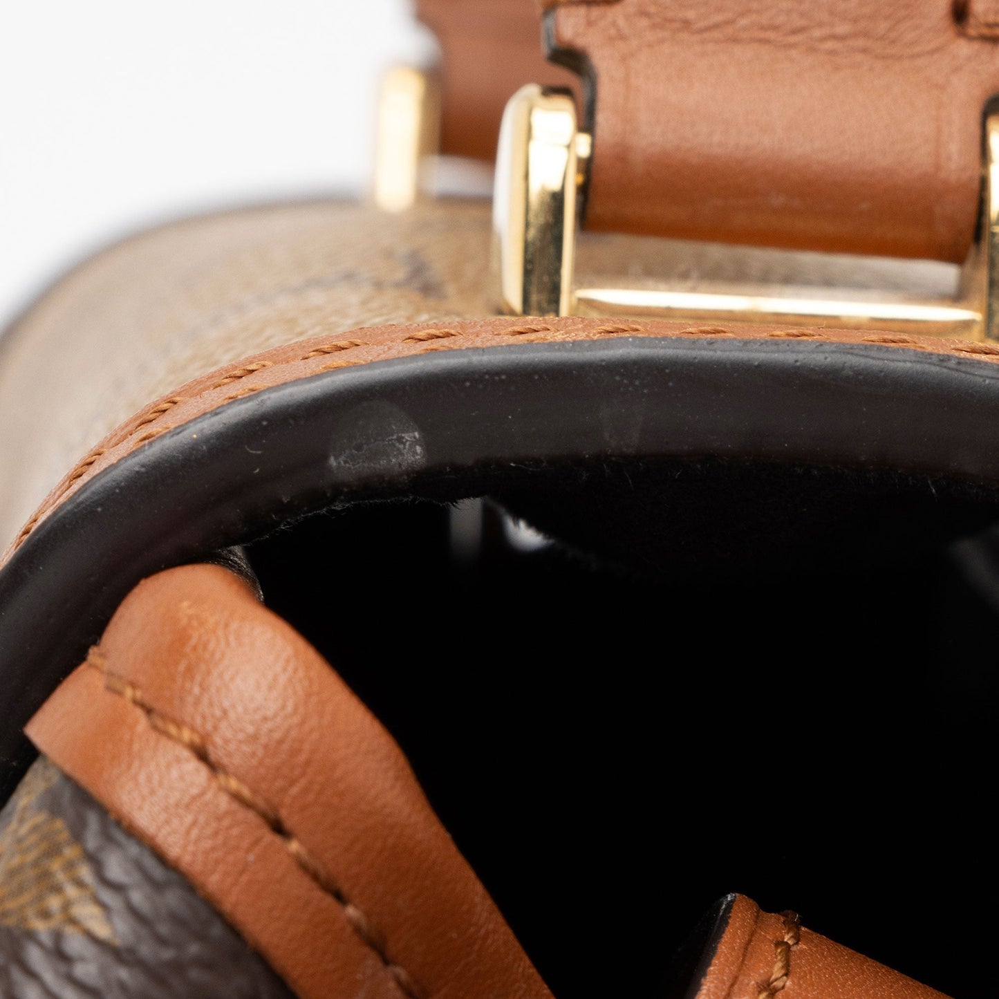 Louis Vuitton Reverse Monogram Dauphine PM Backpack (SHF-pEUZVt)