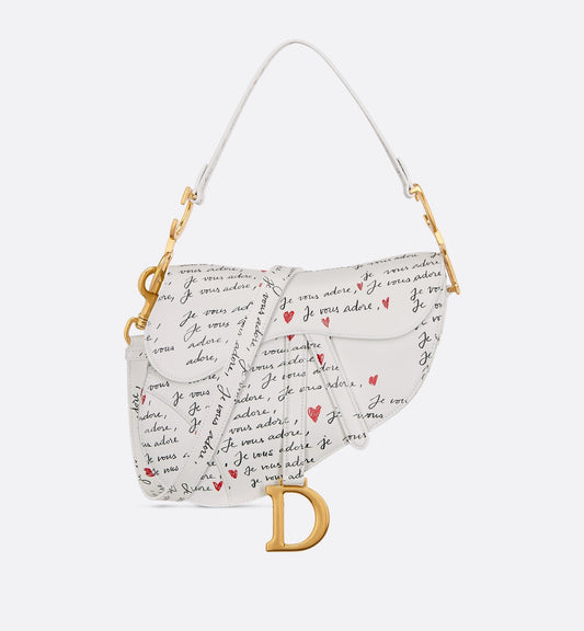 Luxury Dioramour Saddle Bag With Strap White Calfskin With Black And Red Je Vous Adore Print