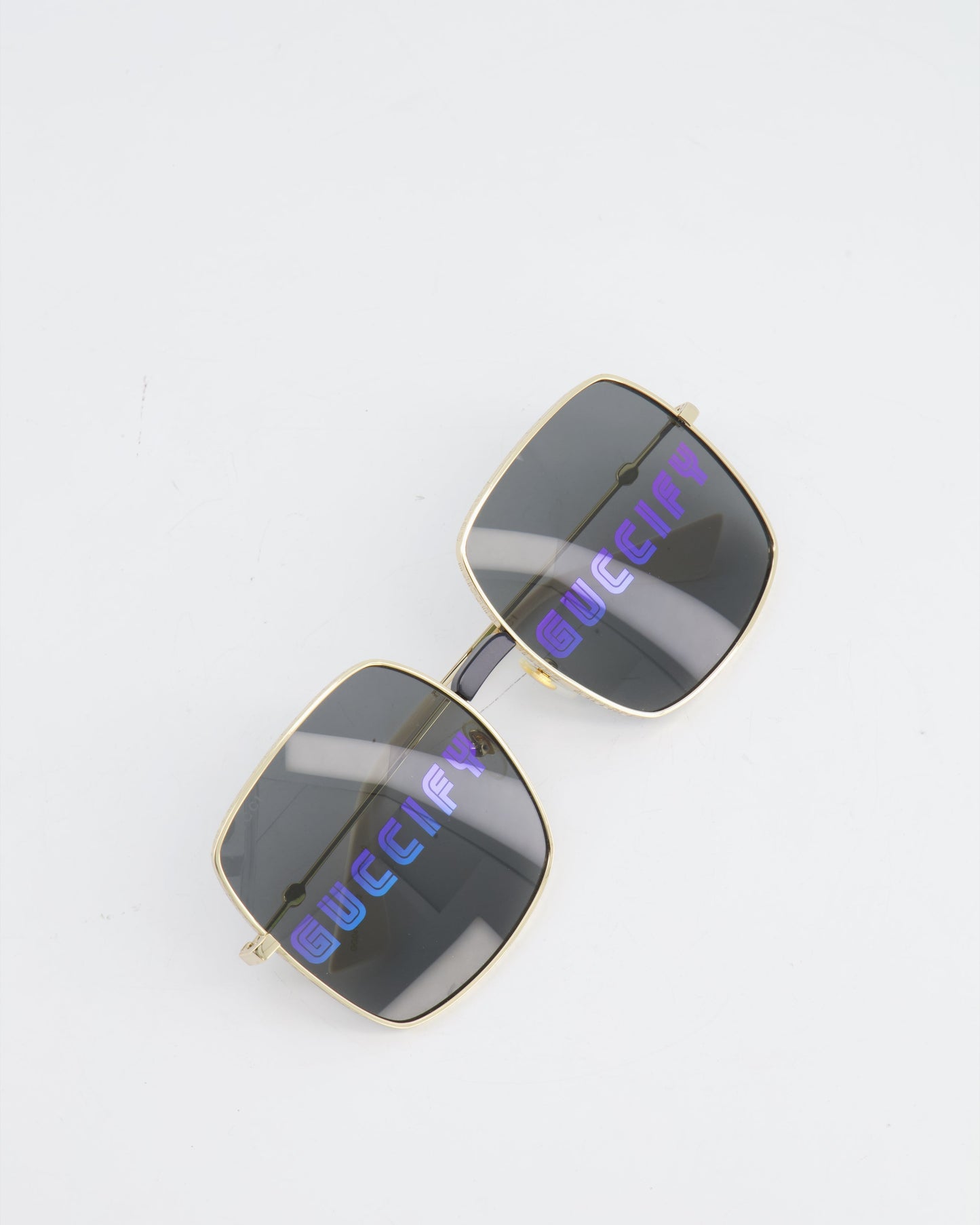 Luxury Gucci Rectangular Metal Frame Sunglasses with Guccify Print