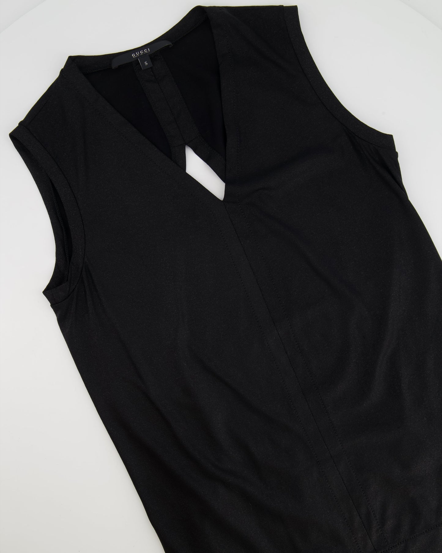 Luxury Gucci Trending 2025 Black Shirt with Open Back and Small Black Luxury Gucci Trending 2025 Logo Detail Size Small