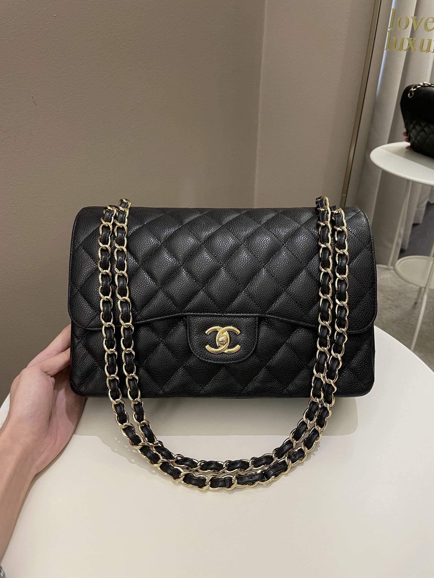 Luxury Chanel Classic Quilted Jumbo Double Flap Black Caviar