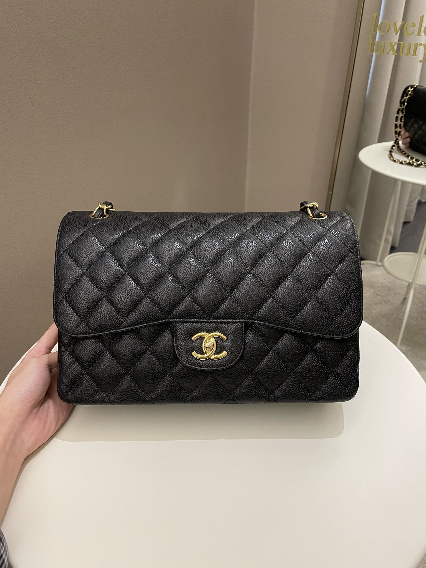 Luxury Chanel Classic Quilted Jumbo Double Flap Black Caviar