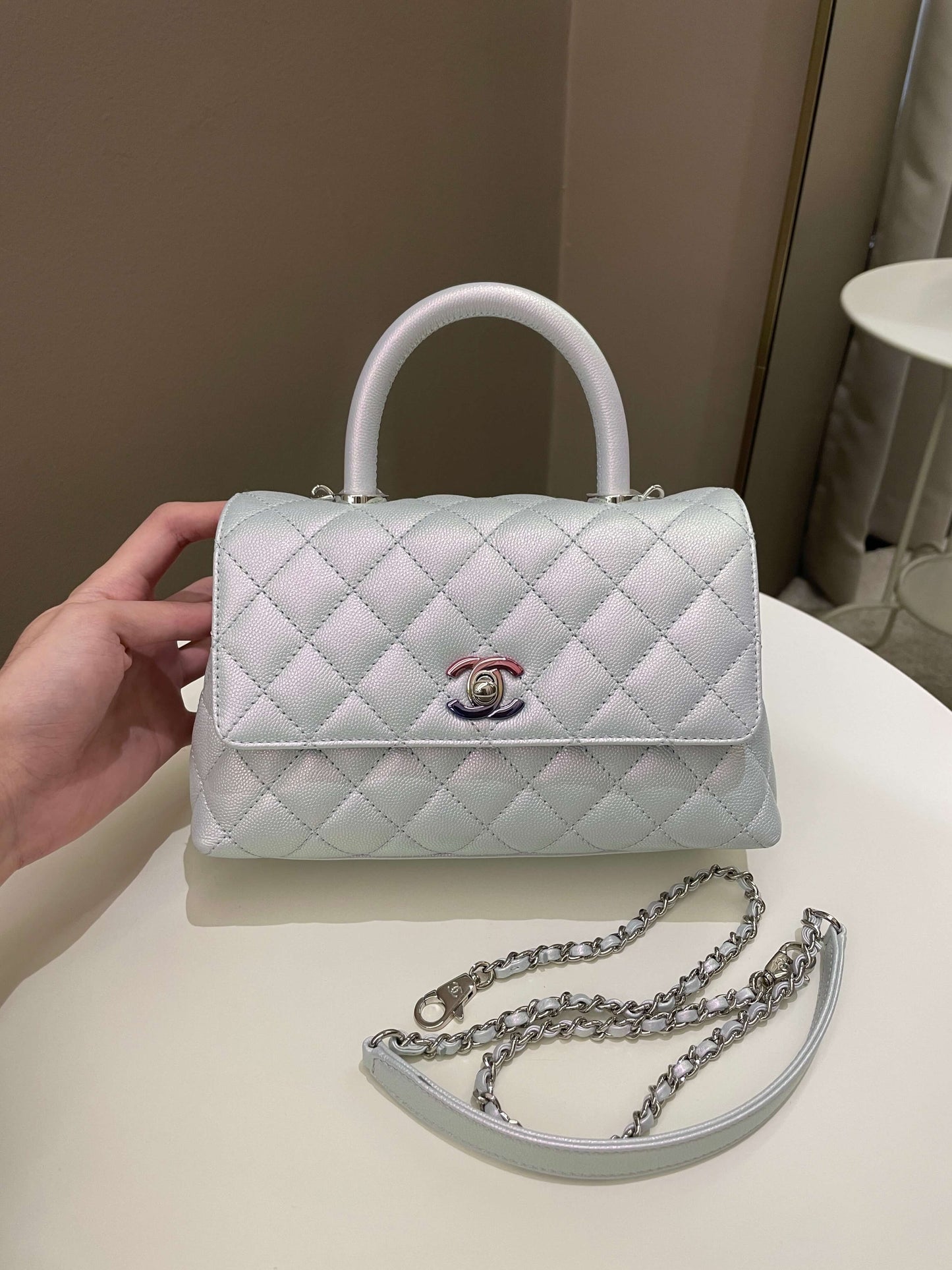 Luxury Chanel 21K Quilted Coco Handle Blue Iridescent Caviar