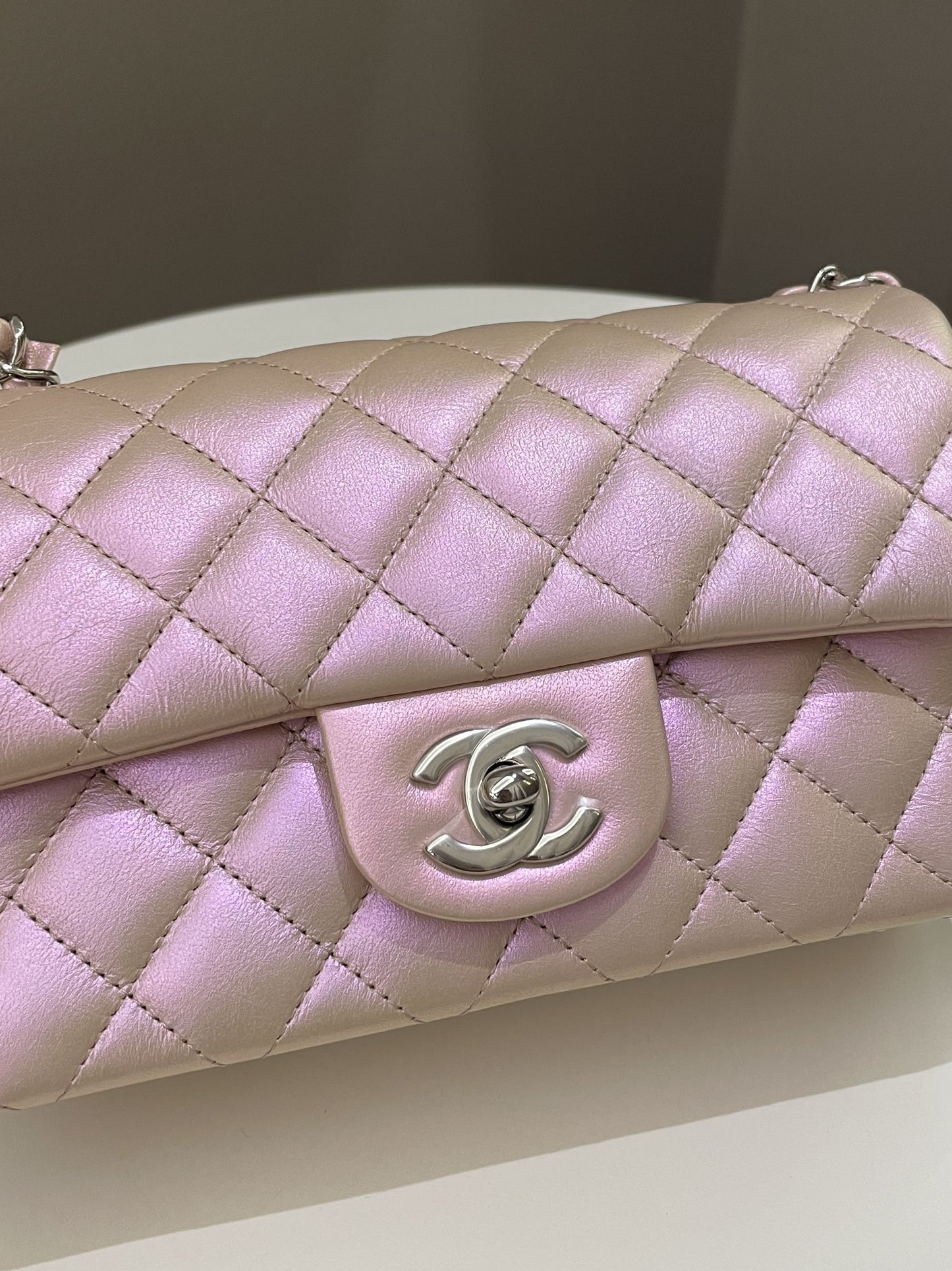Luxury Chanel 21K Quilted Mini Rectangular Iridescent Pink Calfskin
