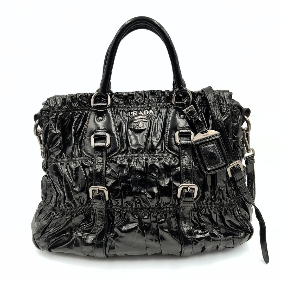 Luxury PradaShopper shoulder bag in black Gaufre paint