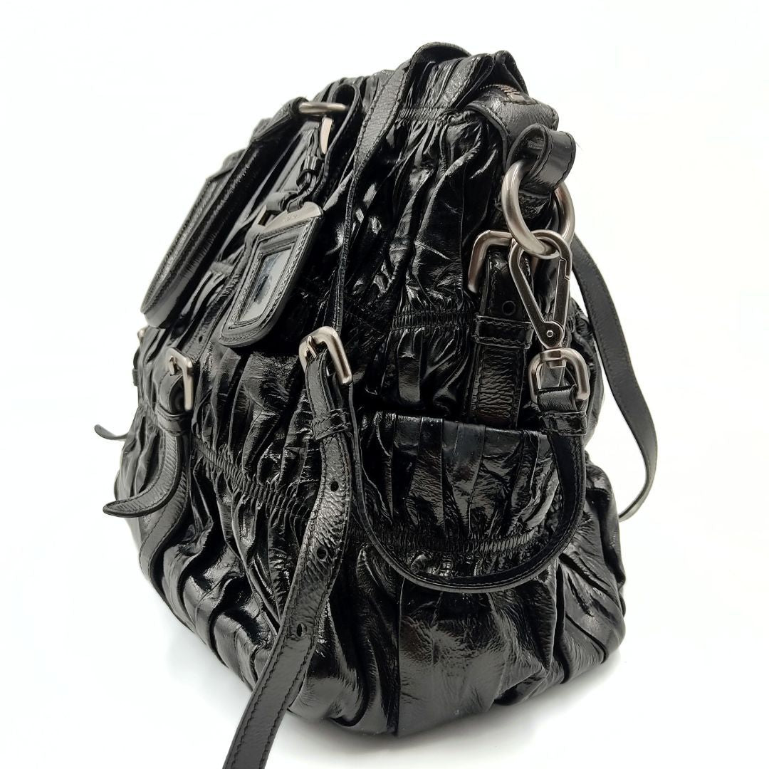 Luxury PradaShopper shoulder bag in black Gaufre paint