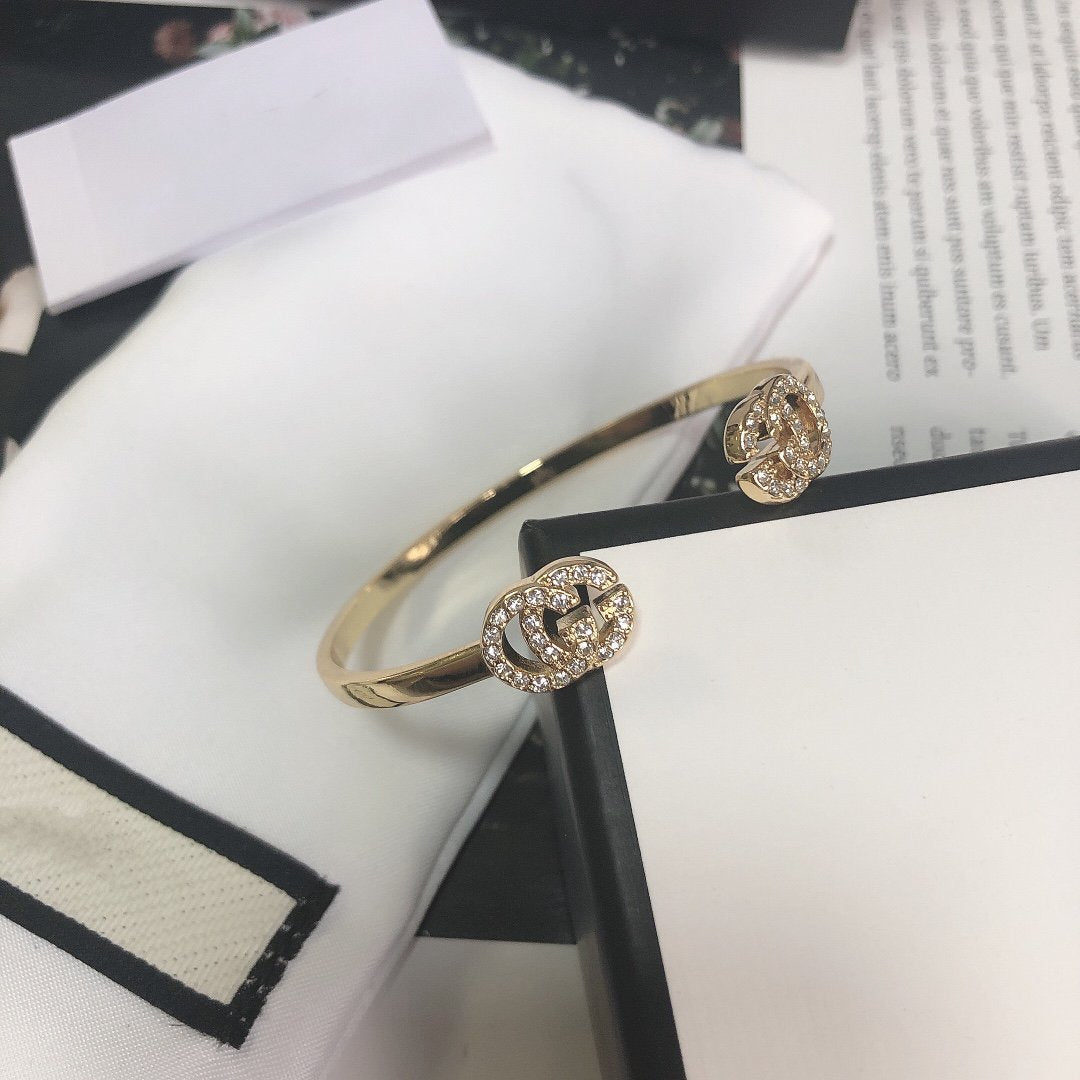 Luxury Gucci GOLD RUNNING DIAMOND LOGO BANGLE BRACELETS