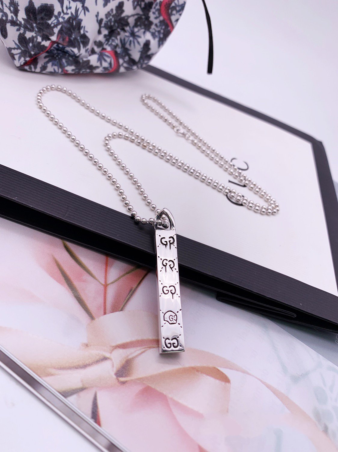 Luxury Gucci GG STERLING SILVER GHOST BAR PENDANT
