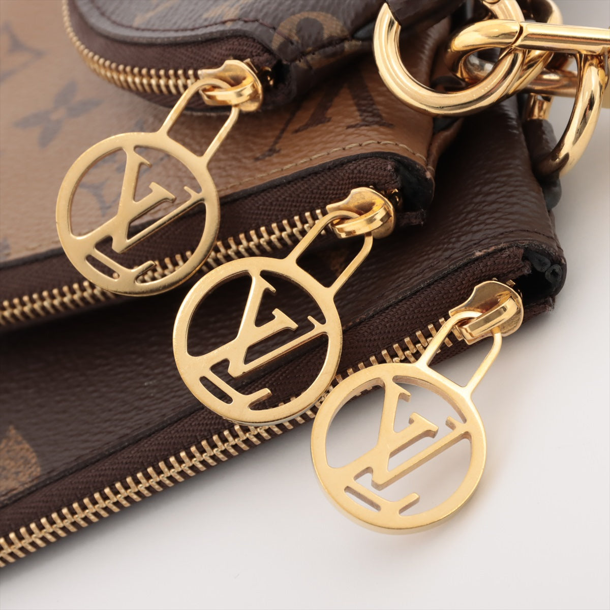 Louis Vuitton Monogram Giant Reversee Poschet Trio M68756 Brown