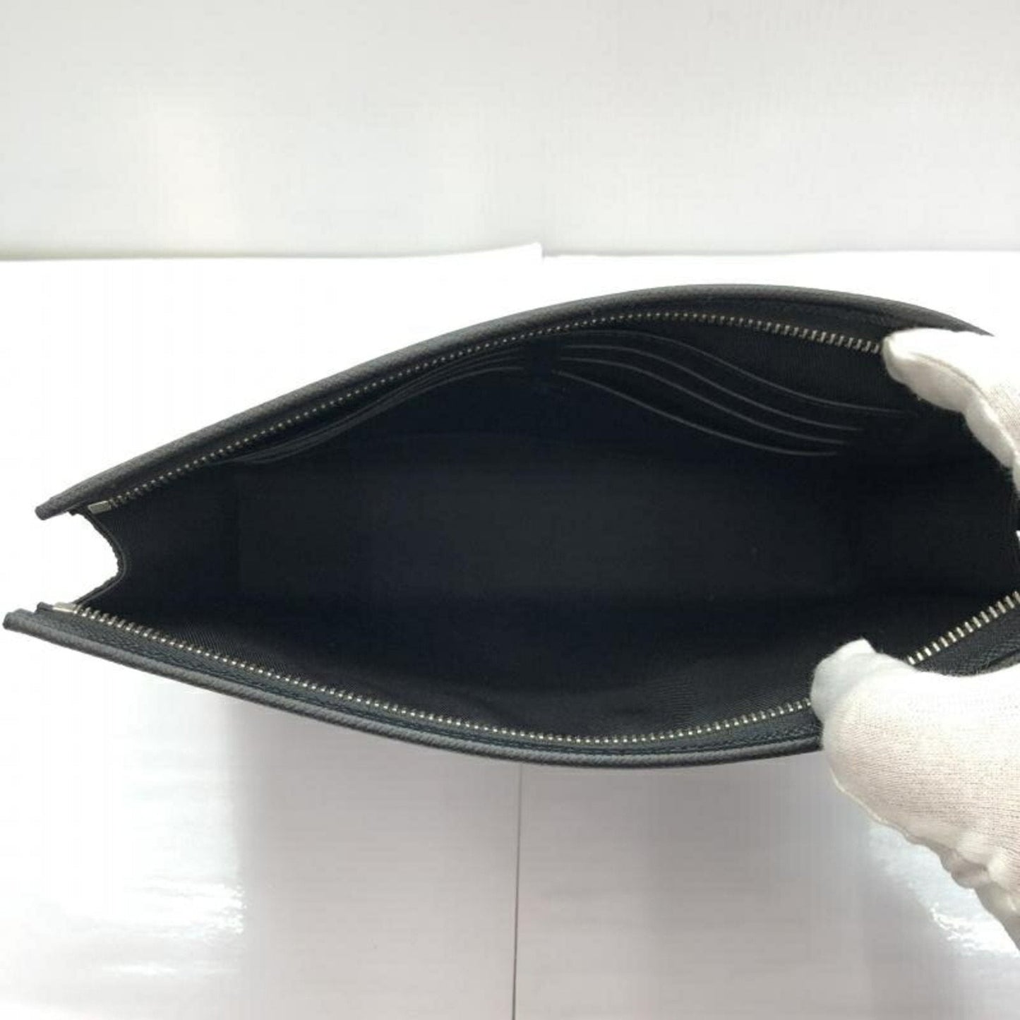 Louis Vuitton Pochette Voyage  Leather Clutch Bag ()