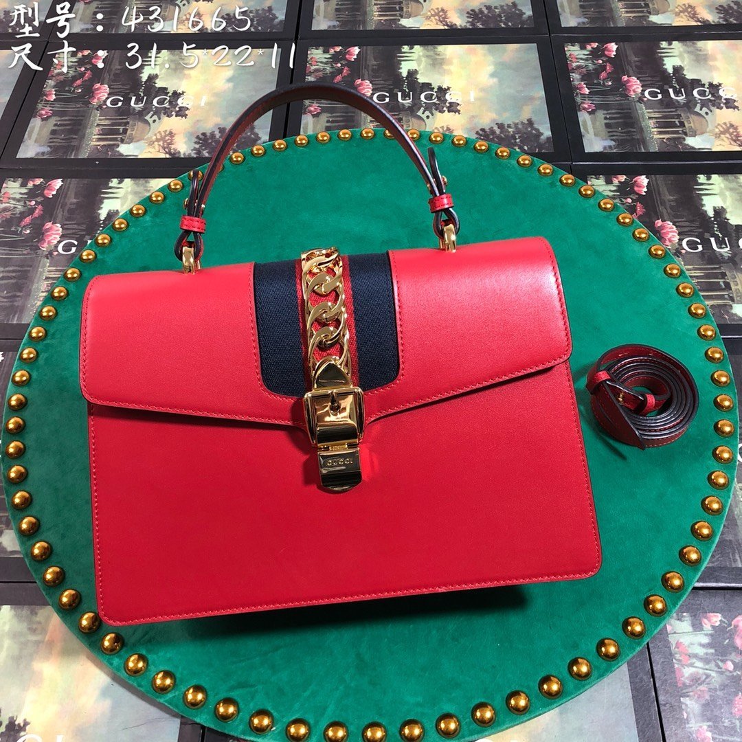 Luxury Gucci GG Sylvie Leather Medium Top Handle Bag