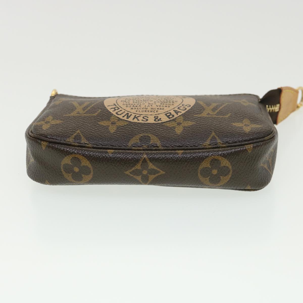 Louis Vuitton Mini Pochette Accessoires  Canvas Clutch Bag ()