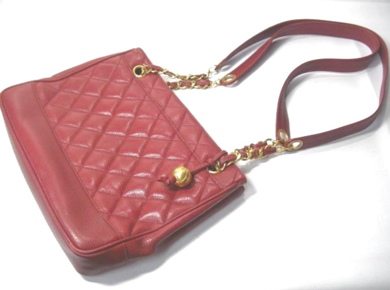 Luxury Chanel Vintage cherry red caviar leather quilted shoulder bag, tote with golden CC ball and chain straps