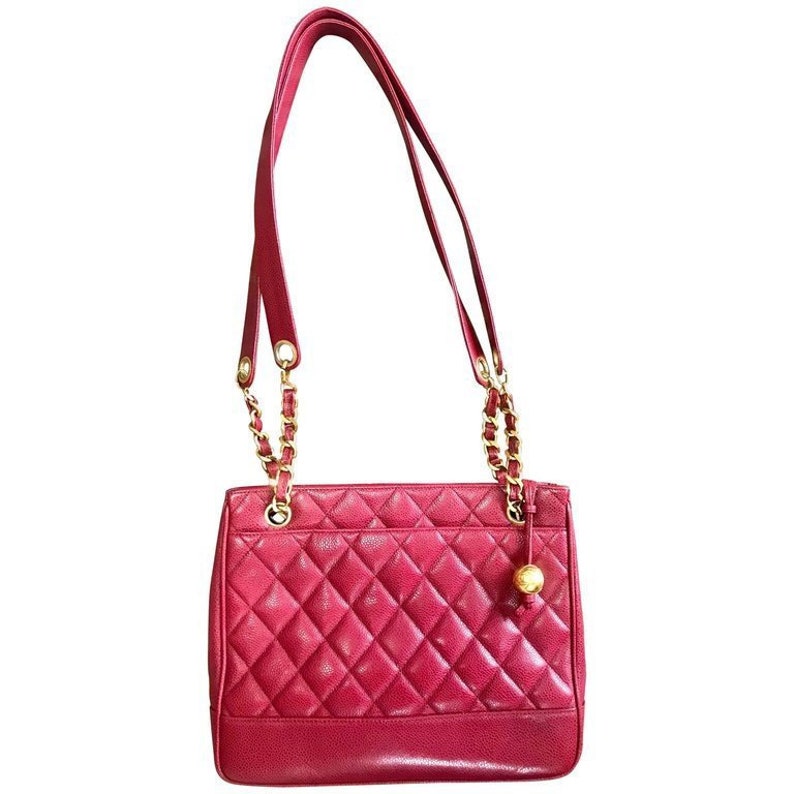 Luxury Chanel Vintage cherry red caviar leather quilted shoulder bag, tote with golden CC ball and chain straps