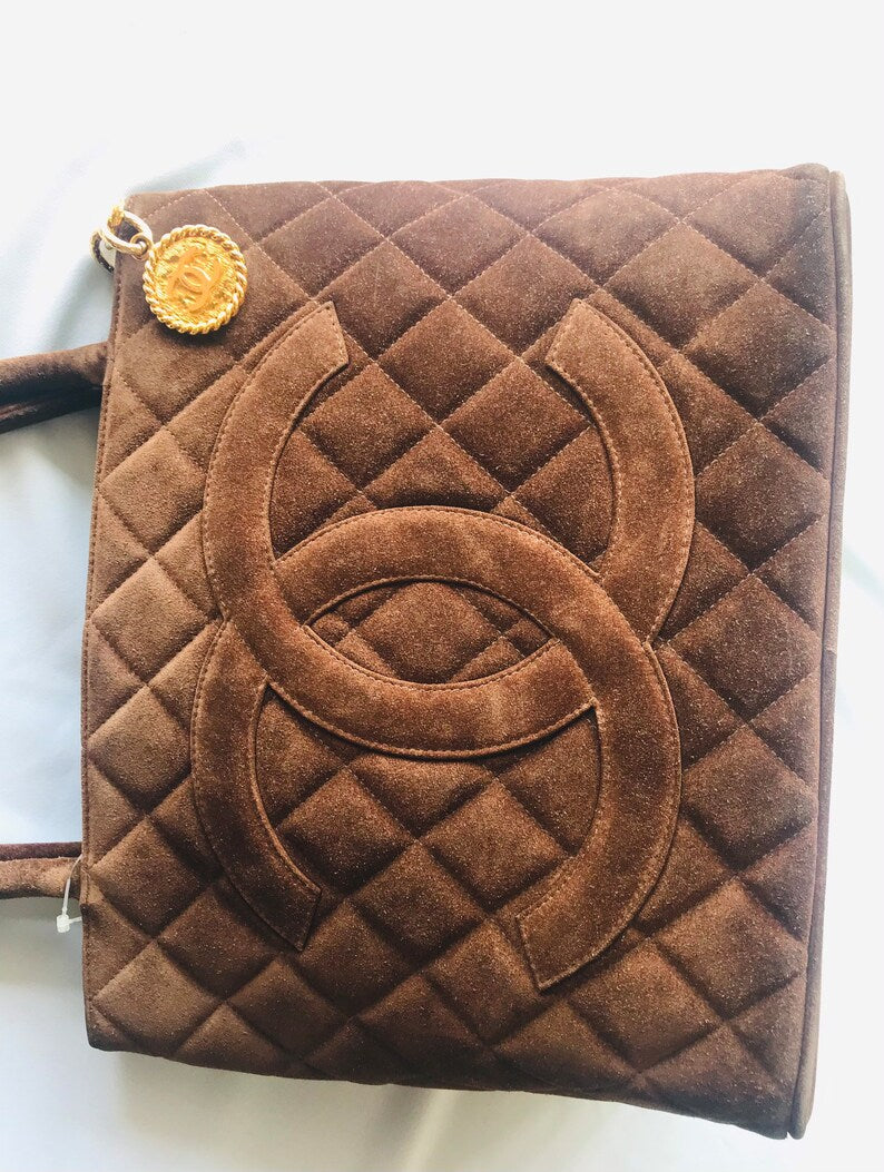Luxury Chanel Vintage brown suede classic tote bag with large CC mark and golden CC medal charm to the zipper