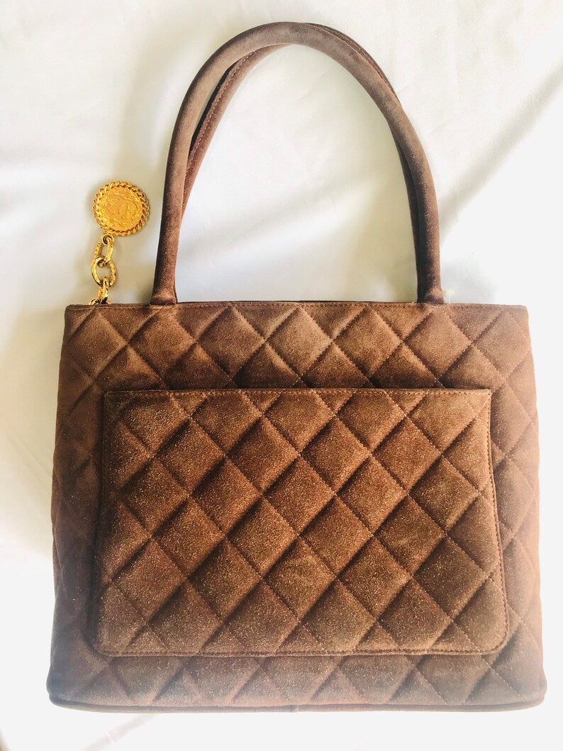 Luxury Chanel Vintage brown suede classic tote bag with large CC mark and golden CC medal charm to the zipper