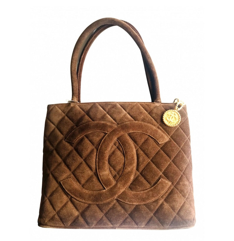 Luxury Chanel Vintage brown suede classic tote bag with large CC mark and golden CC medal charm to the zipper