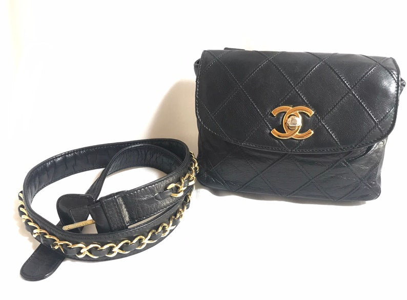 Luxury Chanel Vintage black leather waist purse, fanny pack with golden chain belt and CC closure hock