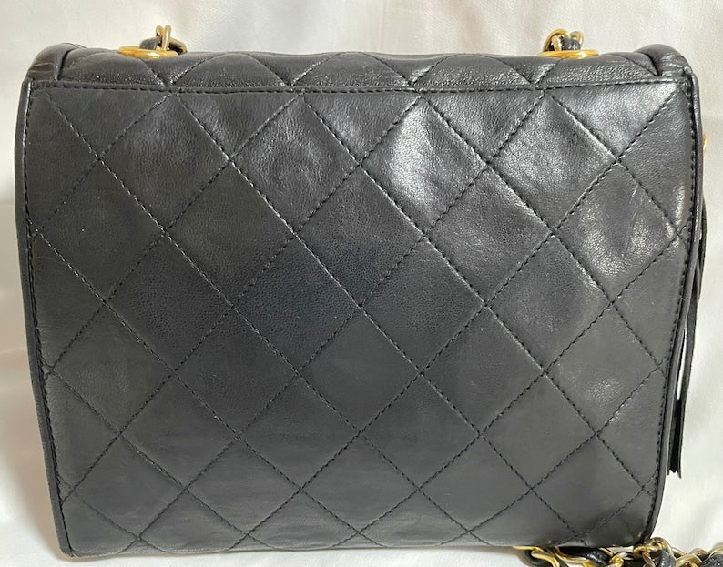Luxury Chanel Vintage black fringe camera bag with double flaps