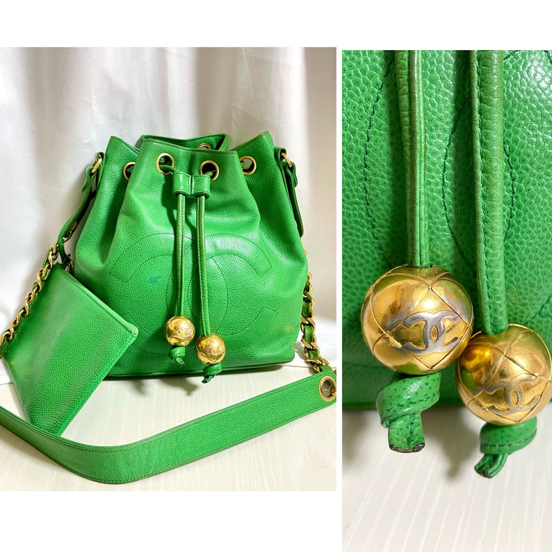 Luxury Chanel Vintage green caviar leather hobo bucket shoulder bag with golden chain strap, drawstrings, and CC stitch mark