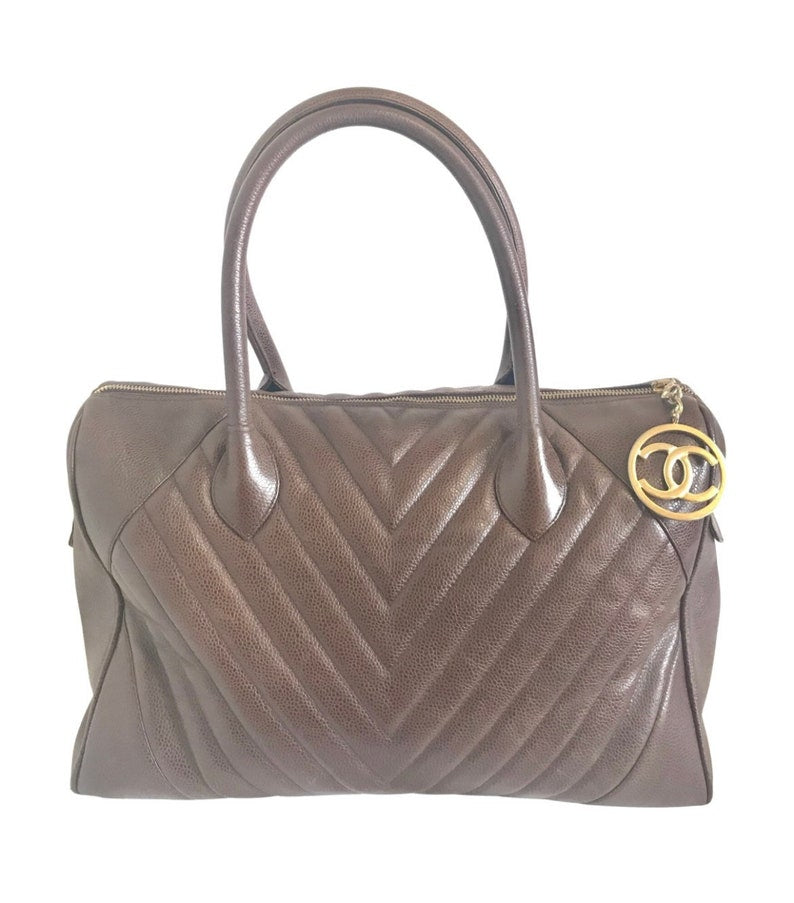 Luxury Chanel Vintage brown caviarskin v stitch, chevron style bag, Speedy bag with golden CC charm