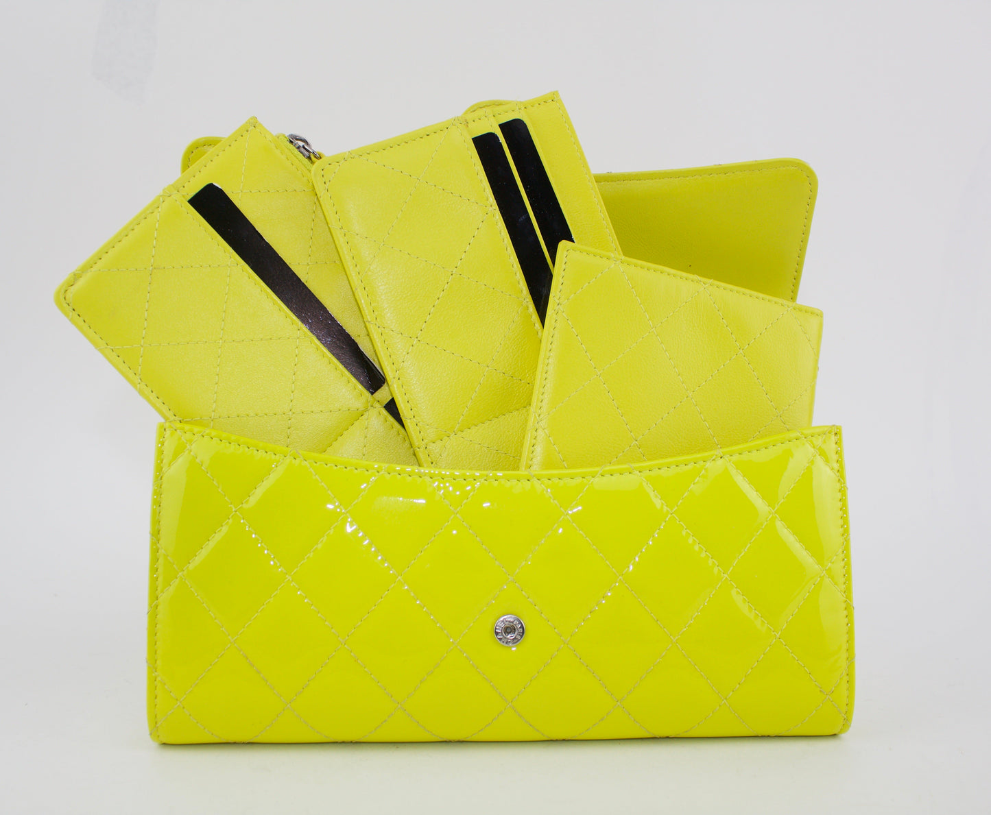 CHANEL PATENT QUILTED TRAVEL WALLET