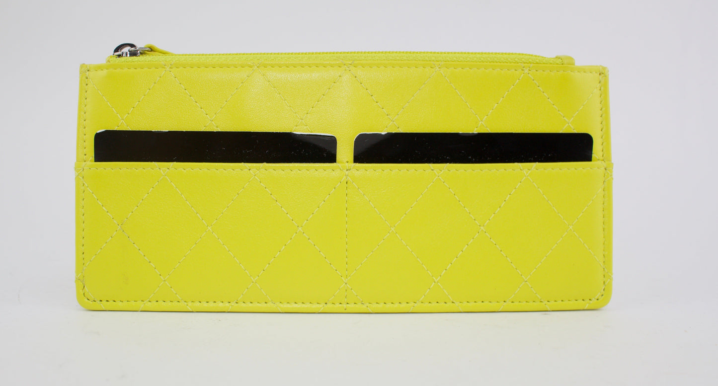 CHANEL PATENT QUILTED TRAVEL WALLET