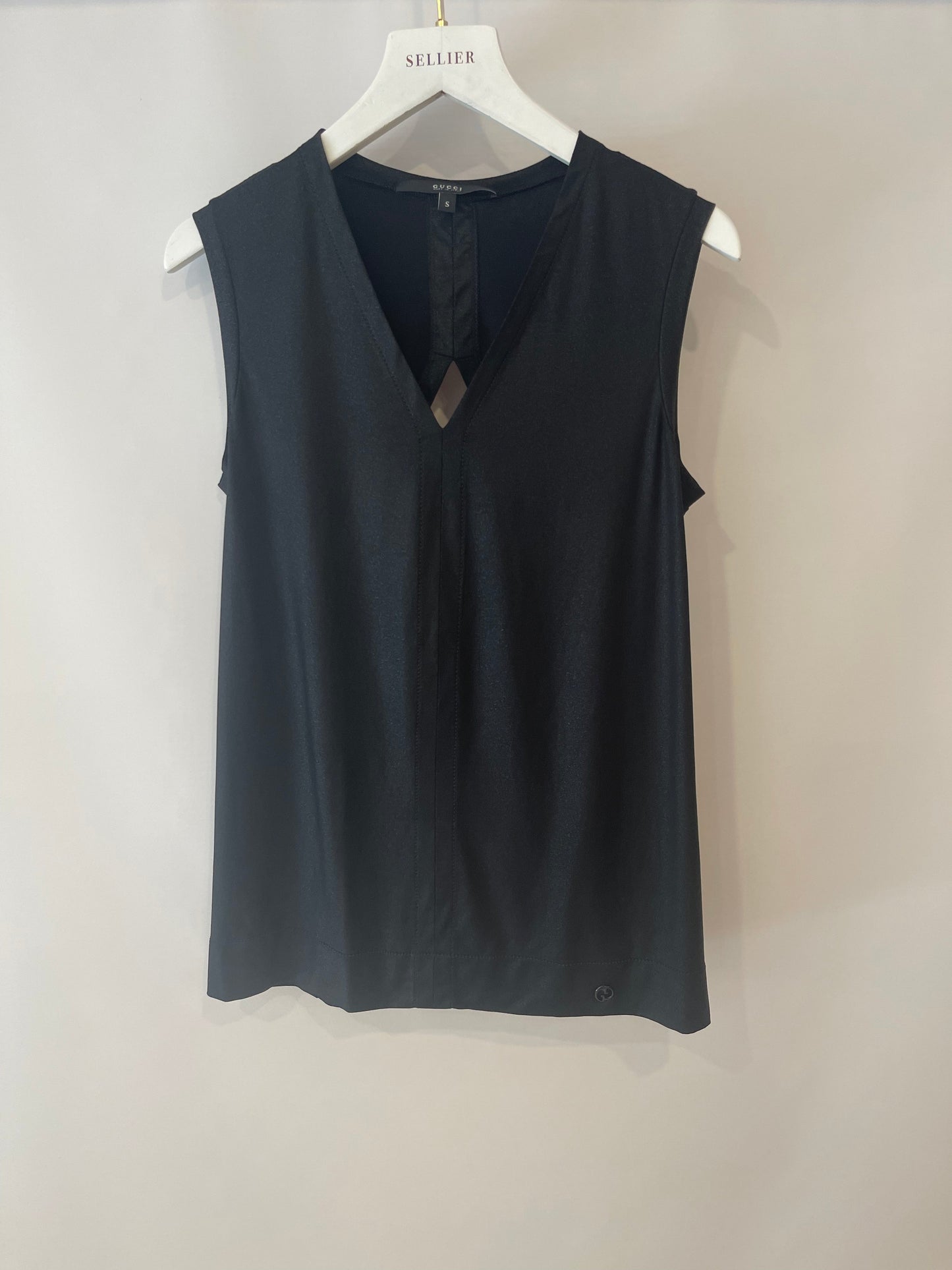 Luxury Gucci Trending 2025 Black Shirt with Open Back and Small Black Luxury Gucci Trending 2025 Logo Detail Size Small