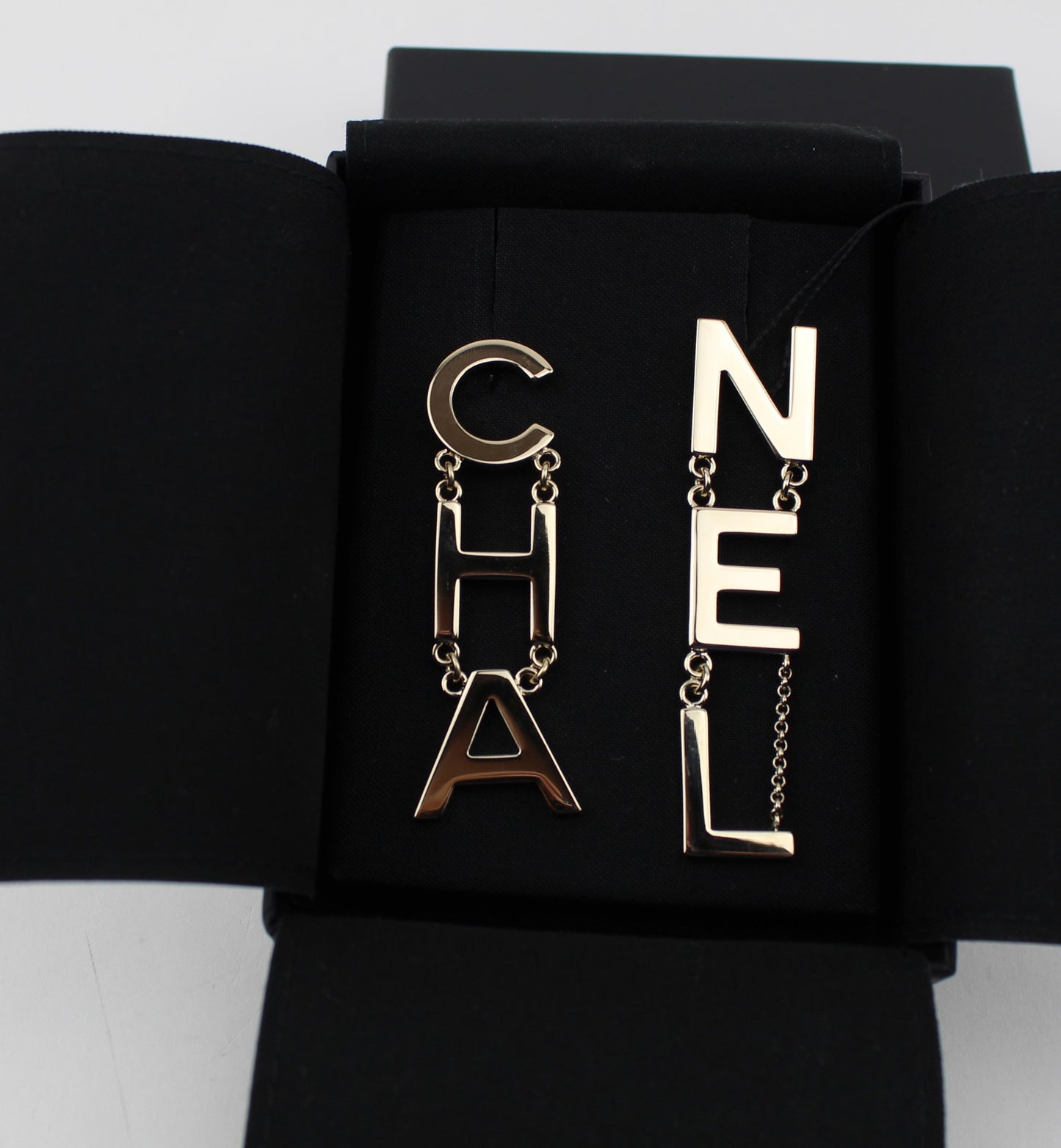 CHANEL METAL CHA-NEL LOGO DROP EARRINGS
