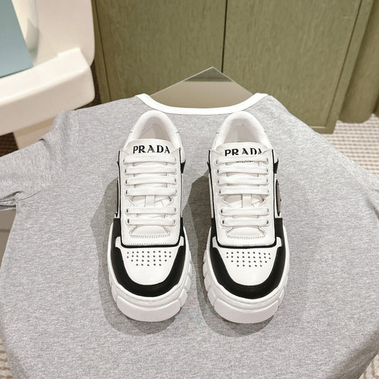 Luxury PradaFLATFORM SNEAKERS BLACK AND WHITE CALFSKIN