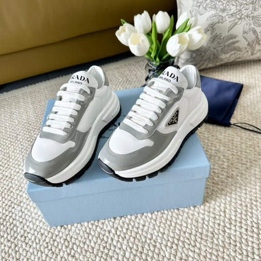 Luxury PradaBLACK THICK SOLE SNEAKER GRAY AND WHITE CALFSKIN