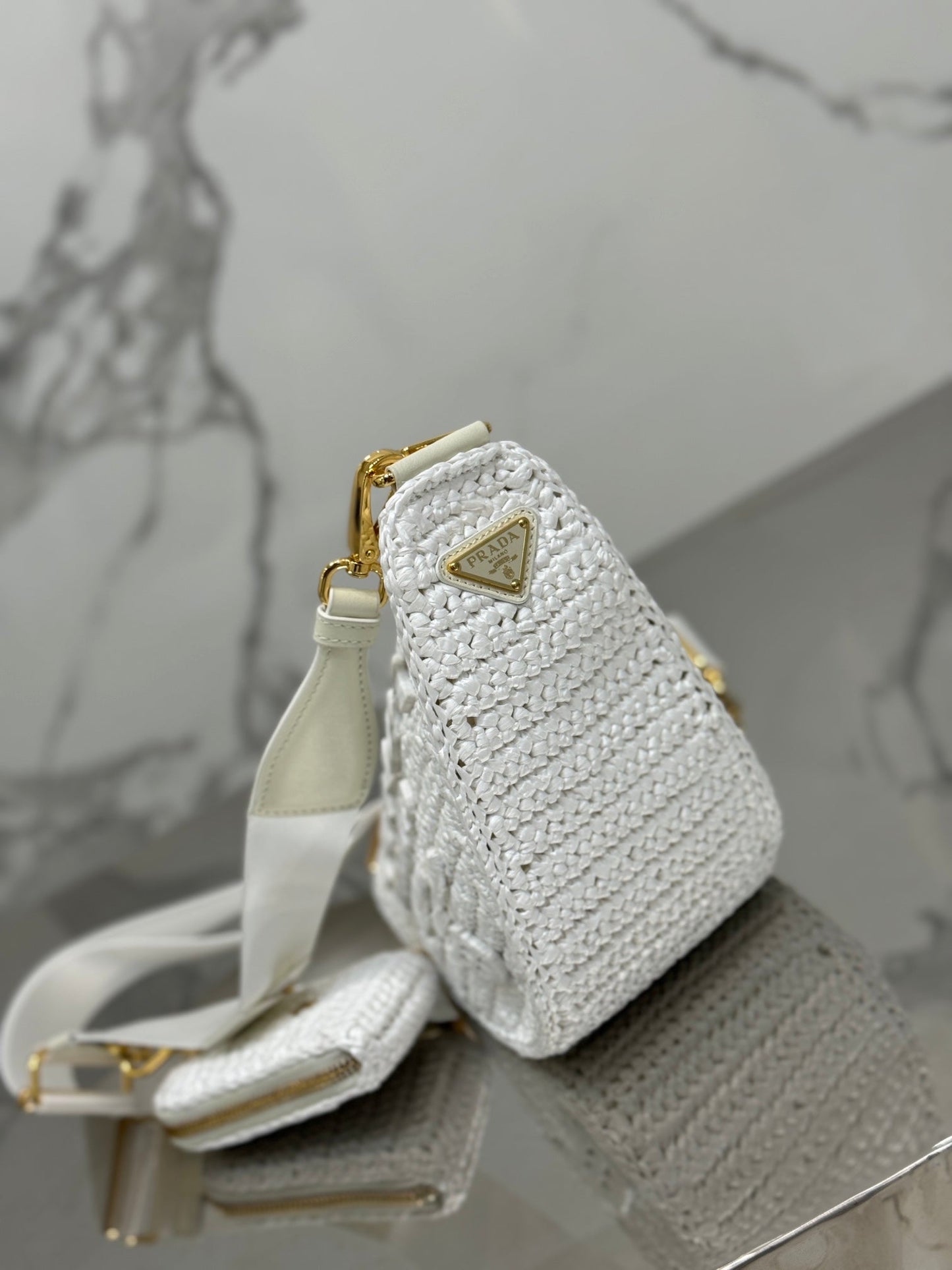 Luxury PradaCROCHET TRIANGLE BAG 26 IN WHITE RAFFIA GOLD HARDWARE