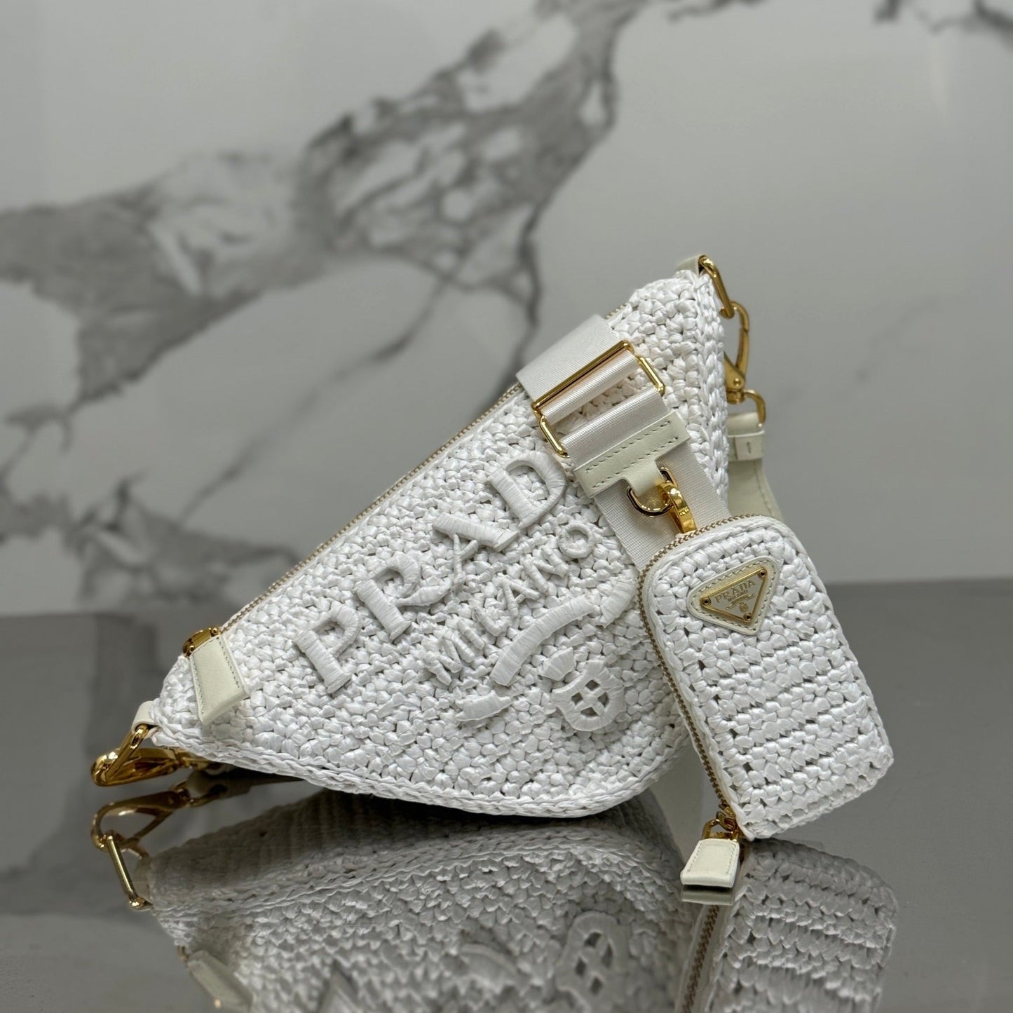Luxury PradaCROCHET TRIANGLE BAG 26 IN WHITE RAFFIA GOLD HARDWARE