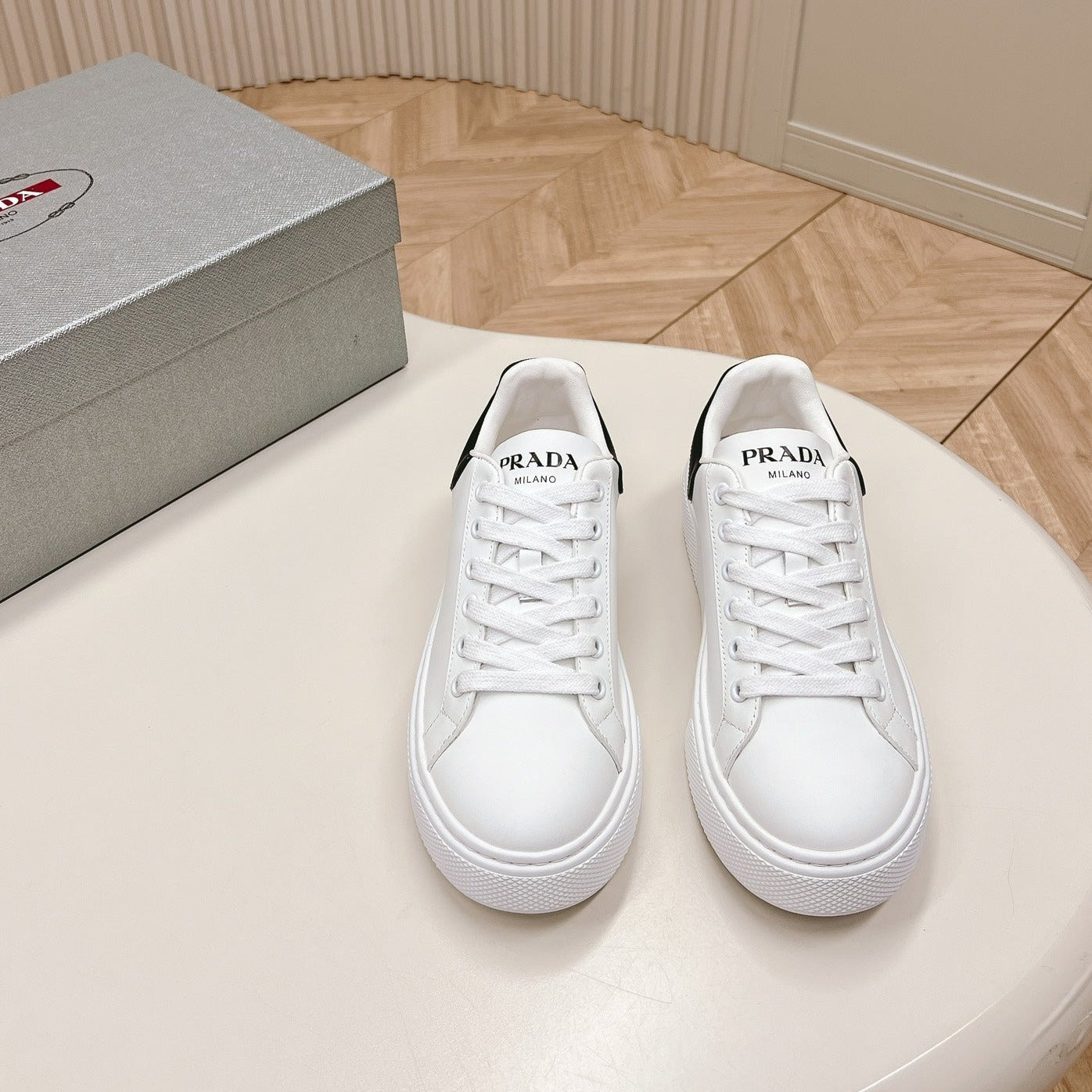 Luxury PradaRETRO SNEAKERS WHITE AND BLACK CALFSKIN