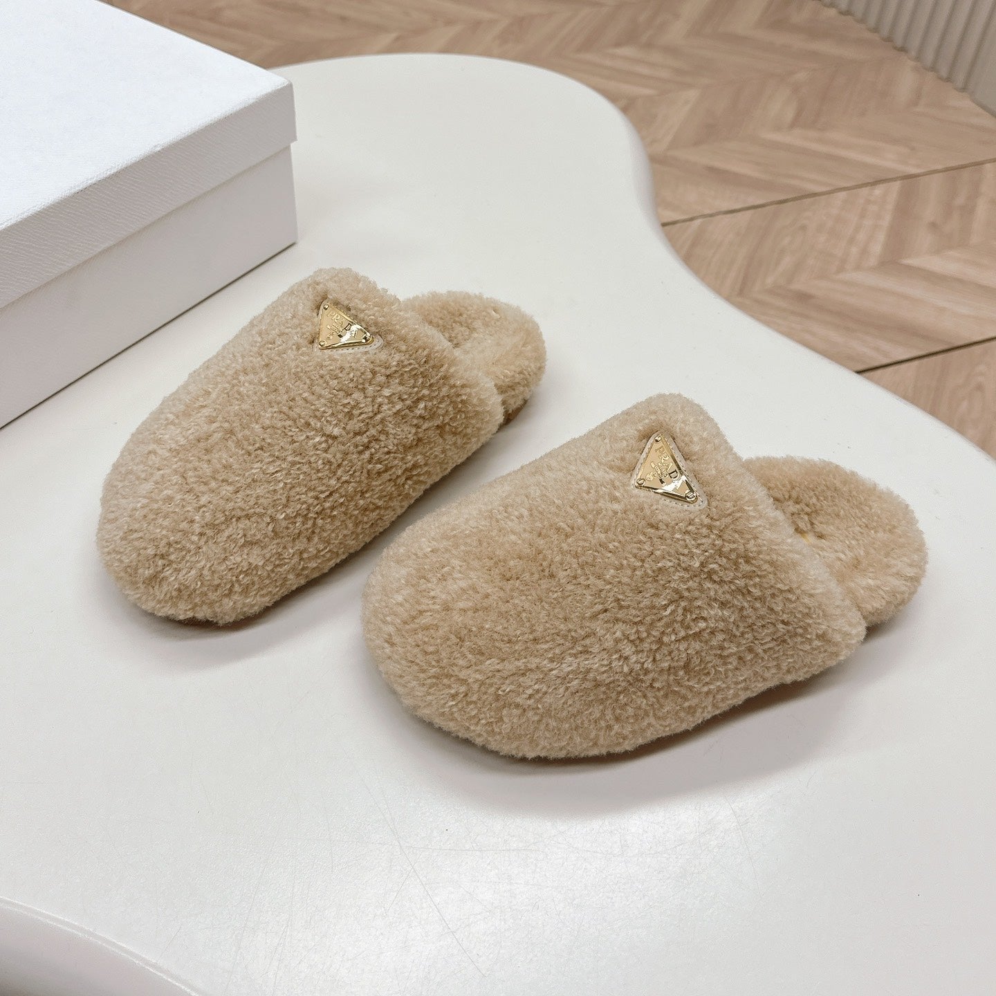 Luxury PradaMULES ATTACHED TRIANGLE LOGO IN BEIGE SHEARLING